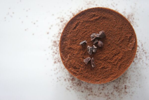 Cacao powder with chocolate nibs on top